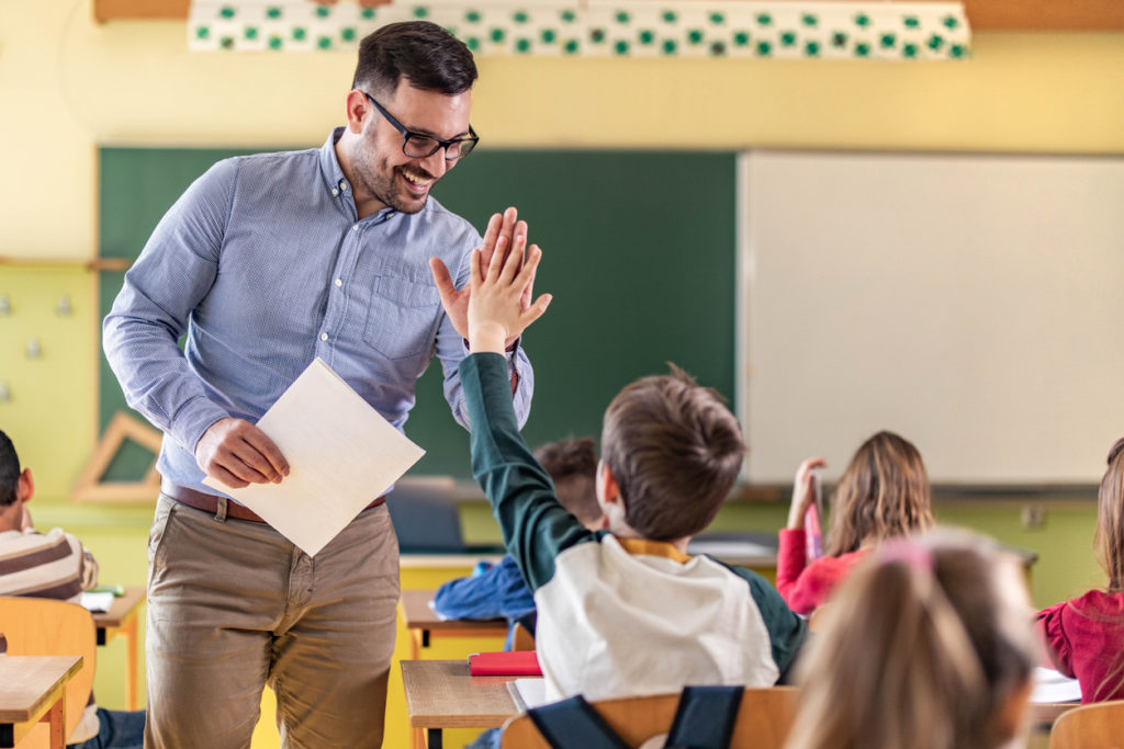 teacher-giving-student-high-five